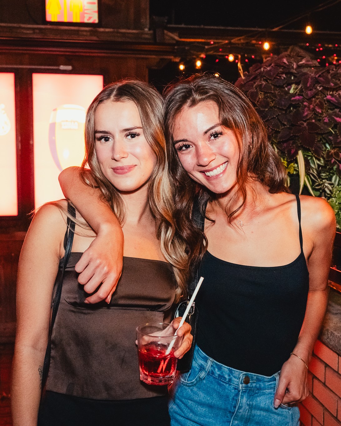 Two girls smiling