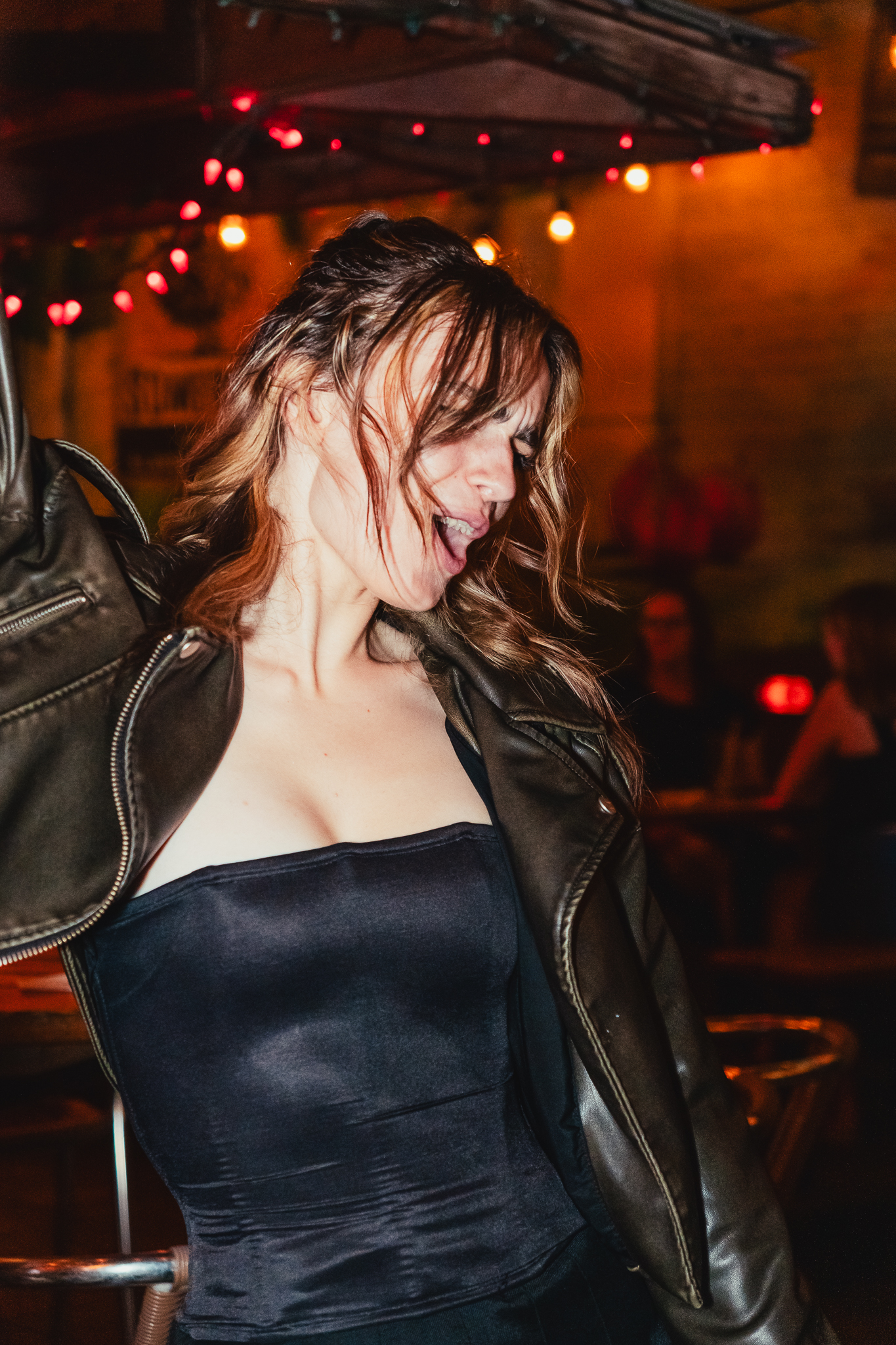 Girl dancing with hands in the air